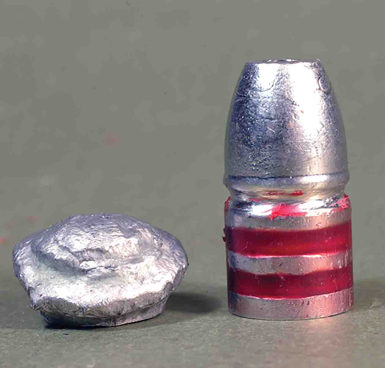 Cast of wheelweights, the bullets mushroomed nearly flat in ballistic wax.